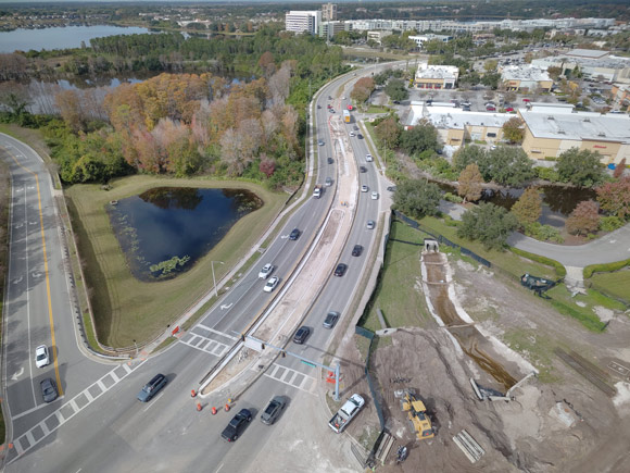 Turkey Lake Road is getting a smooth, new surface ahead of the opening of a ramp system designed to ease congestion at the I-4 and Sand Lake Road interchange.