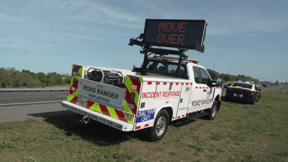 Road-Ranger and FHP set on the side of the highway.