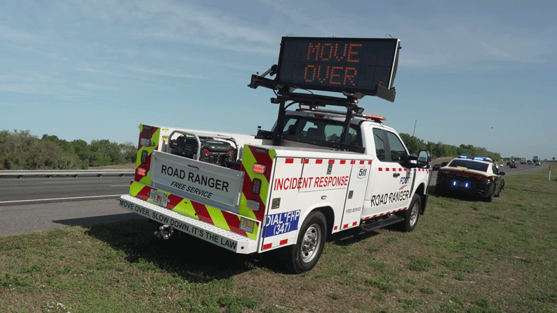 Road-Ranger and FHP set on the side of the highway.